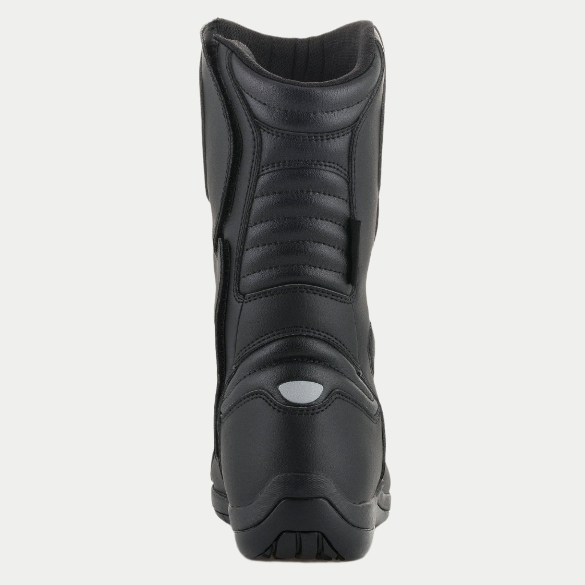 Stivali Alpinestars Origin Drystar®, stivali da moto touring, nero, vista posteriore con zone flex a soffietto su tendine d'Achille e polpaccio, dettaglio riflettente sul tallone e costruzione in microfibra resistente