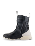 Stivali donna Alpinestars Stella RT-7 Touring Drystar®, nero e bianco, profilo laterale di uno stivale da moto touring alto in microfibra, cerniera laterale con cinturini regolabili, tallone e suola a contrasto bianco sporco