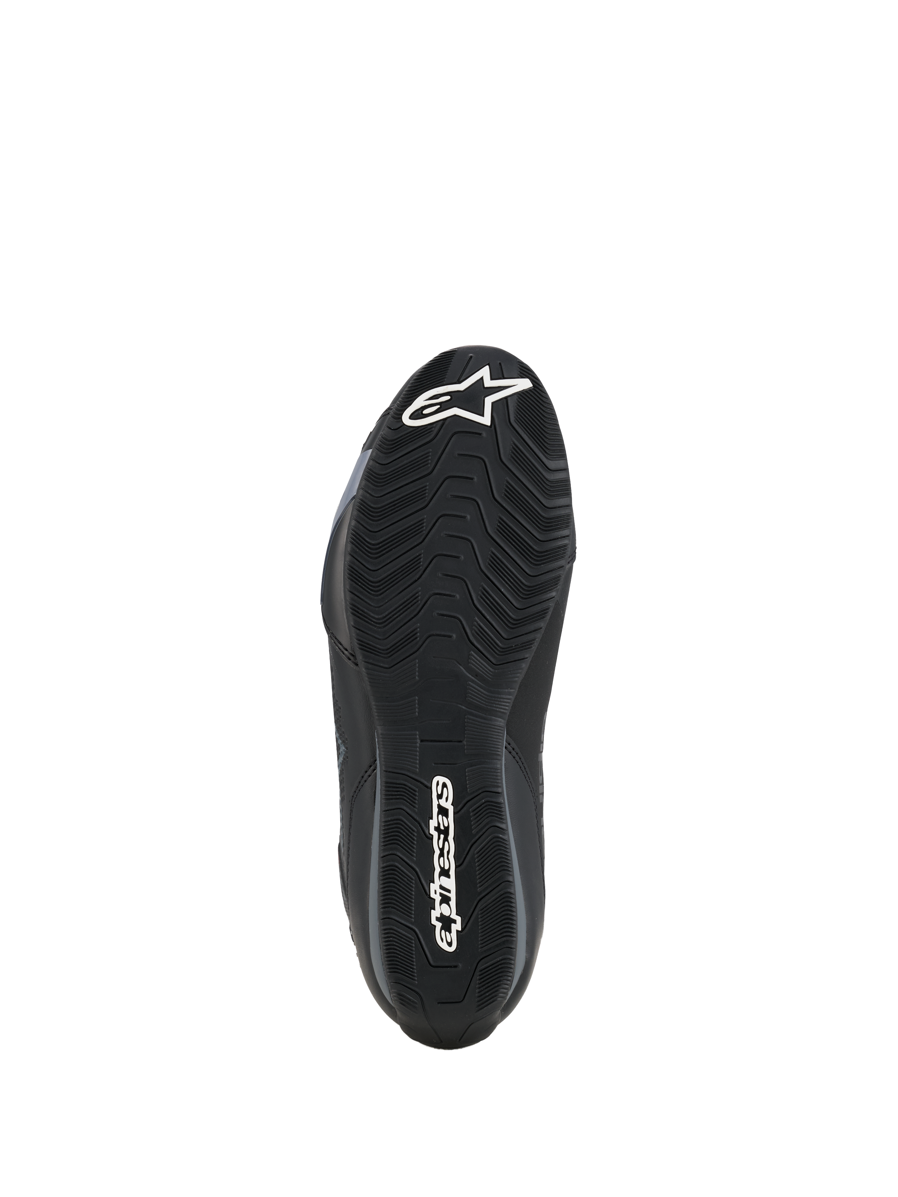 Scarpe Alpinestars Celer, vista della suola, mescola in gomma nera resistente all'olio con motivo grip ondulato e testurizzato, loghi Alpinestars bianchi sulla punta e sul tallone, progettate per l'aderenza sulle pedane della moto