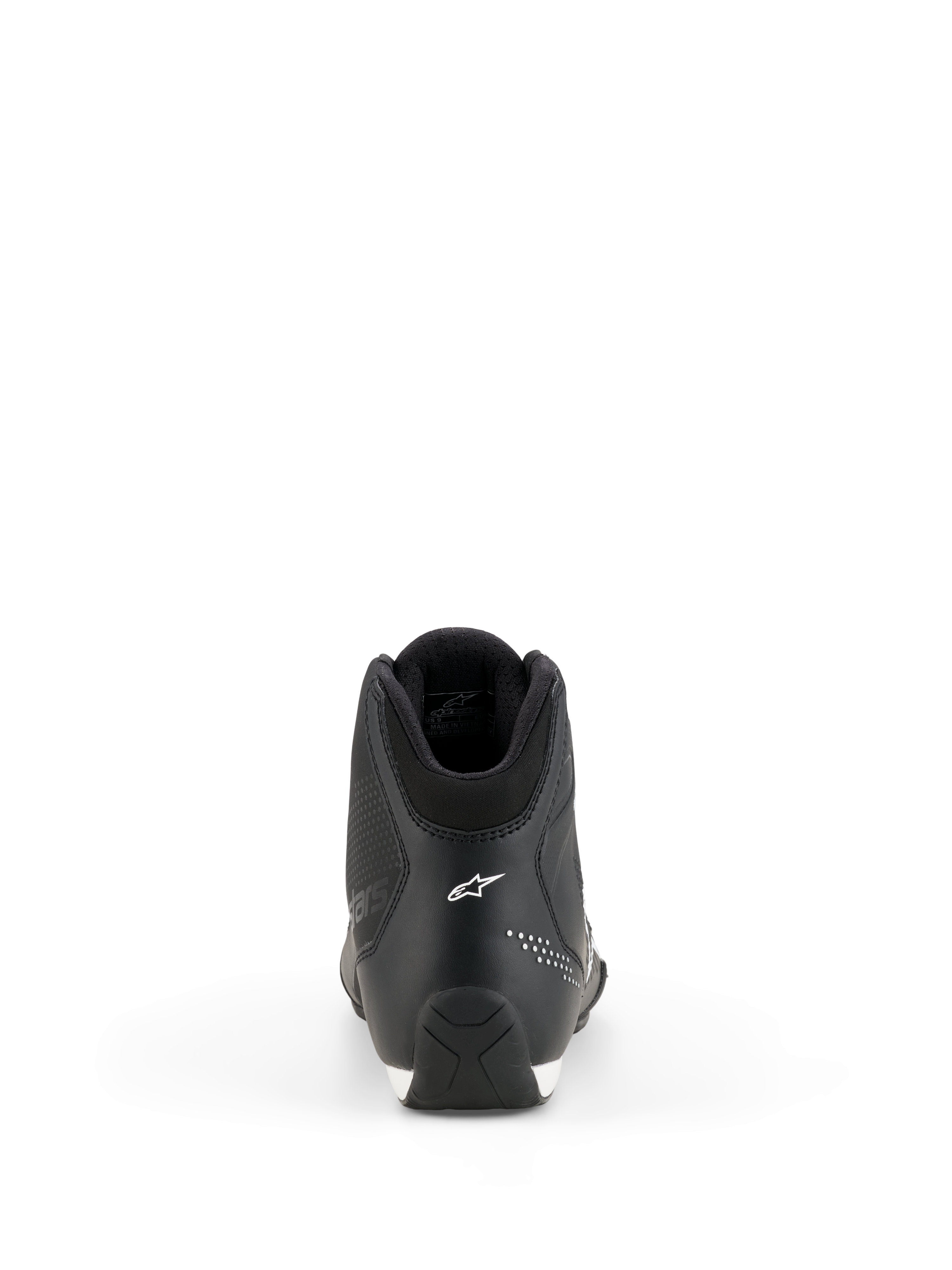 Alpinestars Celer Shoes, scarpe da moto, nero e bianco, vista posteriore che mostra la costruzione del tallone, logo a stella Alpinestars bianco, dettagli microforati e suola in gomma testurizzata per la guida sportiva ad alte prestazioni