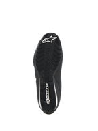 Scarpe Alpinestars Celer, scarpe da moto, nero bianco, vista della parte inferiore della suola in gomma resistente all'olio con motivo di aderenza testurizzato e marchio Alpinestars bianco.