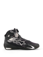 Alpinestars Scarpe Celer Superair, scarpe da moto, nero e bianco, vista laterale con motivi grafici bianchi e grande logo Astar, sistema di chiusura Rotor sulla linguetta, protezione della caviglia in TPU con branding 'ONE GOAL ONE VISION', tomaia in tessuto traspirante per prestazioni con il caldo