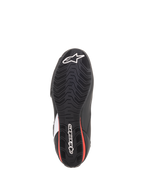 Scarpe Alpinestars Faster-3 Rideknit®, vista della suola, nero e rosso, suola in gomma testurizzata con logo a stella e marchio Alpinestars bianchi, calzature da moto stradali