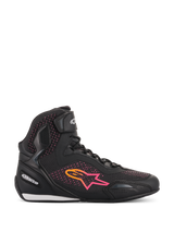 Scarpe Alpinestars Stella Faster-3 Rideknit® da donna, scarpe da moto, nero, giallo e rosa, profilo laterale con tomaia in maglia traspirante, logo a stella con sfumatura vivace e cinturino a strappo sulla caviglia.