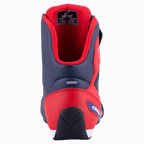 Alpinestars Austin Riding Shoe, blu notte e rosso brillante, vista posteriore che mostra il contrafforte del tallone in TPU rinforzato, fodera in mesh rossa e suola in gomma testurizzata, calzatura da moto sportiva