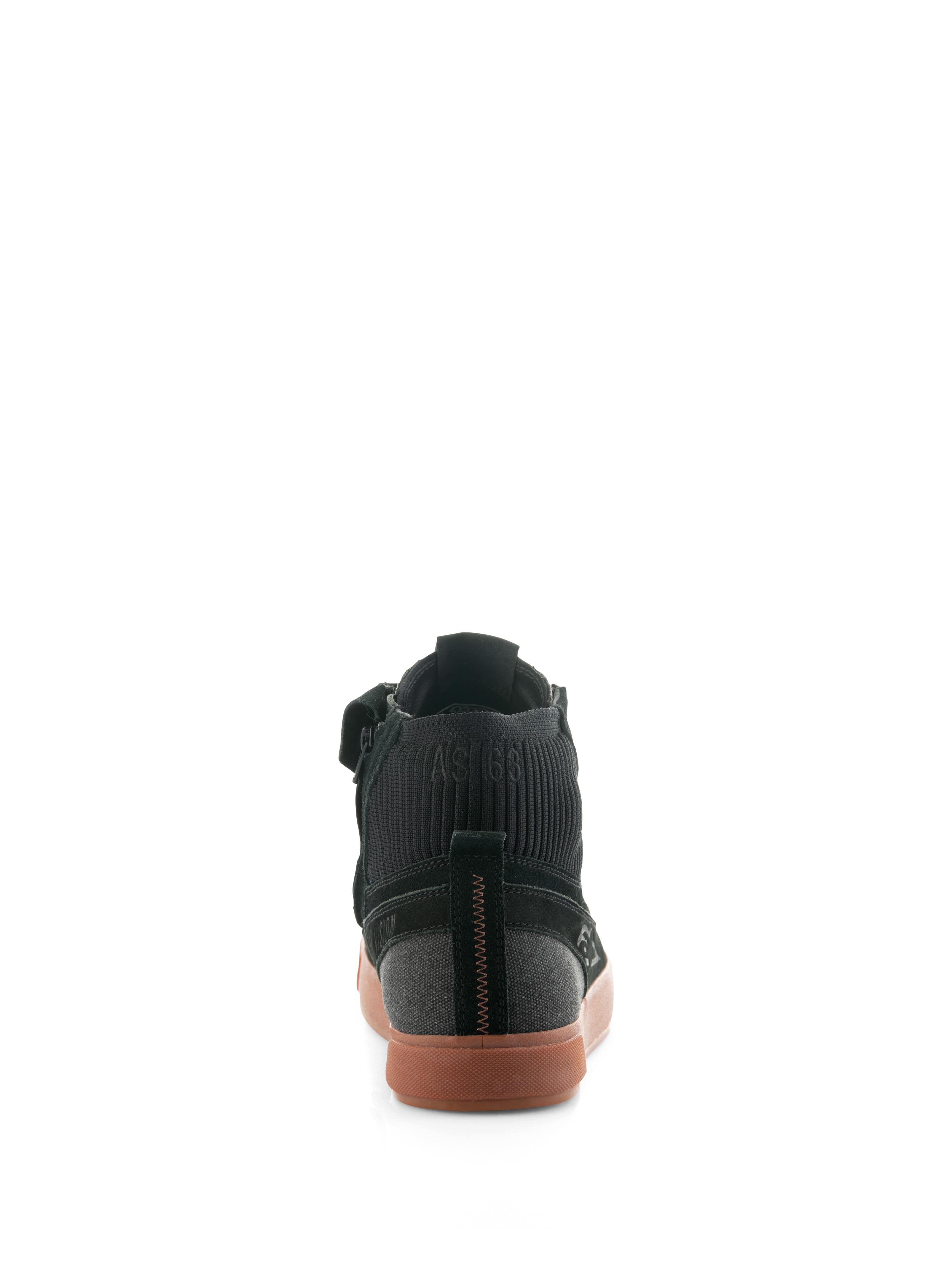 Scarpe Alpinestars Stated, scarpe da moto urbane Black Gum, vista posteriore con suola in gomma vulcanizzata, tomaia in camoscio nero e tela, colletto della caviglia in maglia a coste