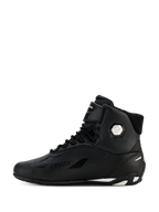 Scarpe Alpinestars Stella Faster-4 Drystar® da donna, nero e argento, vista laterale di profilo, scarpe da moto impermeabili con tomaia in microfibra, chiusura con lacci e cinturino a strappo, con marchio Drystar e logo argento sulla caviglia.