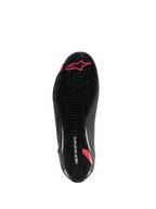Scarpe Alpinestars Stella Faster-4 Drystar®, scarpe da moto da donna, nero e corallo fluo, vista inferiore della suola in gomma testurizzata con motivo grip, logo Astars e marchio Alpinestars.