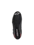 Scarpe Alpinestars Faster-3 Drystar®, scarpe da moto, nero e rosso fluo, vista dal basso della suola, suola in gomma testurizzata con battistrada ondulato, con logo a stella e scritta Alpinestars bianchi, calzature tecniche impermeabili