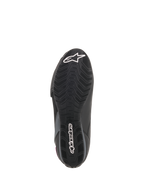Scarpe Alpinestars Stella Faster-3 Drystar® da donna, vista della suola, suola in gomma nera con motivo grip testurizzato, logo a stella e scritta Alpinestars in bianco, calzatura robusta da moto