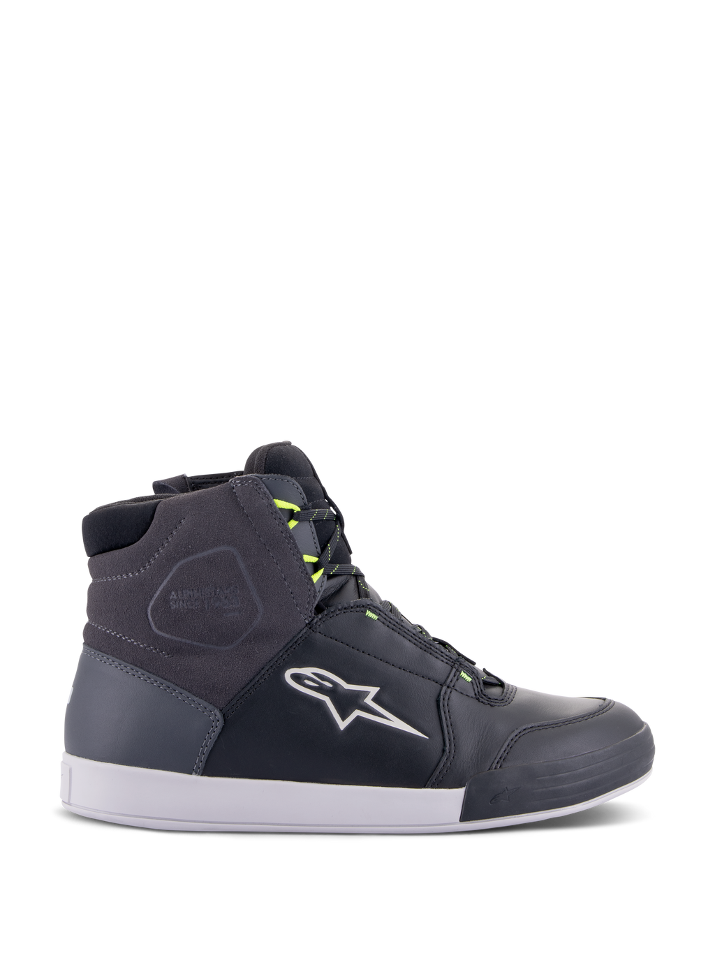 Alpinestars Chrome Drystar Shoes, sneaker da moto urban in nero, grigio scuro e giallo fluo, con pannelli in pelle e pelle scamosciata, suola bianca, lacci giallo neon e logo a stella distintivo