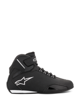 Scarpe Alpinestars Stella Sektor Waterproof da donna, nero e argento, profilo laterale di una scarpa da moto alta con tomaia in microfibra leggera, logo Astars bianco e chiusura sicura con lacci e cinturino