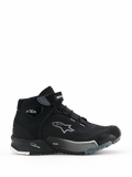 Alpinestars CR-X Women's Drystar Riding Shoes, sneaker da moto alte nere, vista laterale di calzature da moto urbane da donna con chiusura con lacci e cinturino in velcro alla caviglia, logo Alpinestars a stella bianco, marchi 'Drystar' e 'TPF' sull'intersuola, suola in gomma robusta con motivi bianchi e grigi.