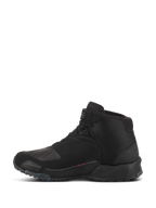 Scarpe da moto Alpinestars CR-X Drystar, scarpe da moto, nero, vista laterale del profilo, design alto con silhouette da scarpa da running, dotate di zona del cambio in TPU rinforzato, suola tassellata per il grip e costruzione impermeabile per guida urbana e stradale.