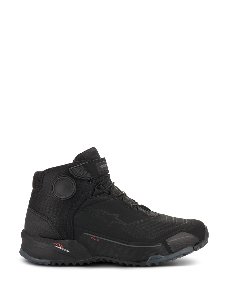 Scarpe da moto Alpinestars CR-X Drystar®, scarpe da moto, nero, vista di profilo, design elegante ispirato alle sneaker con suola robusta, con marchio Drystar e dischi protettivi sulla caviglia