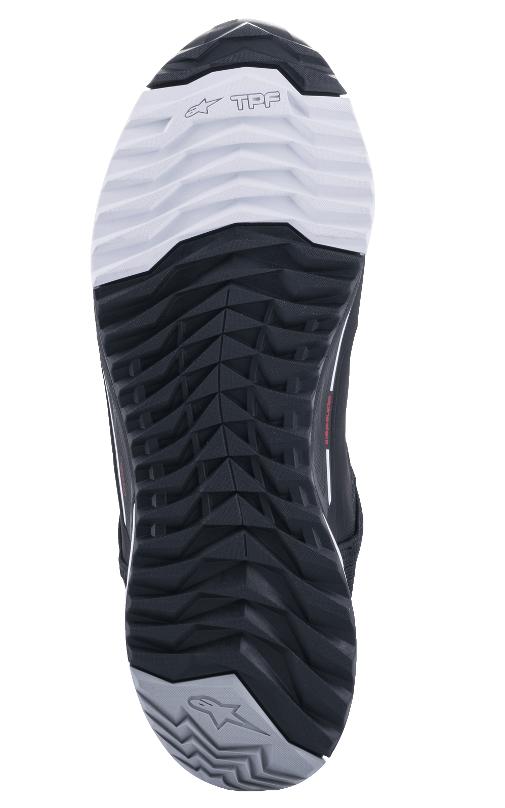 Alpinestars CR-X Drystar® Riding Shoes, vista della suola, suola in doppia mescola di gomma nera, bianca e grigia, disegno asimmetrico dei tacchetti per l'aderenza, con marchio TPF e loghi a stella