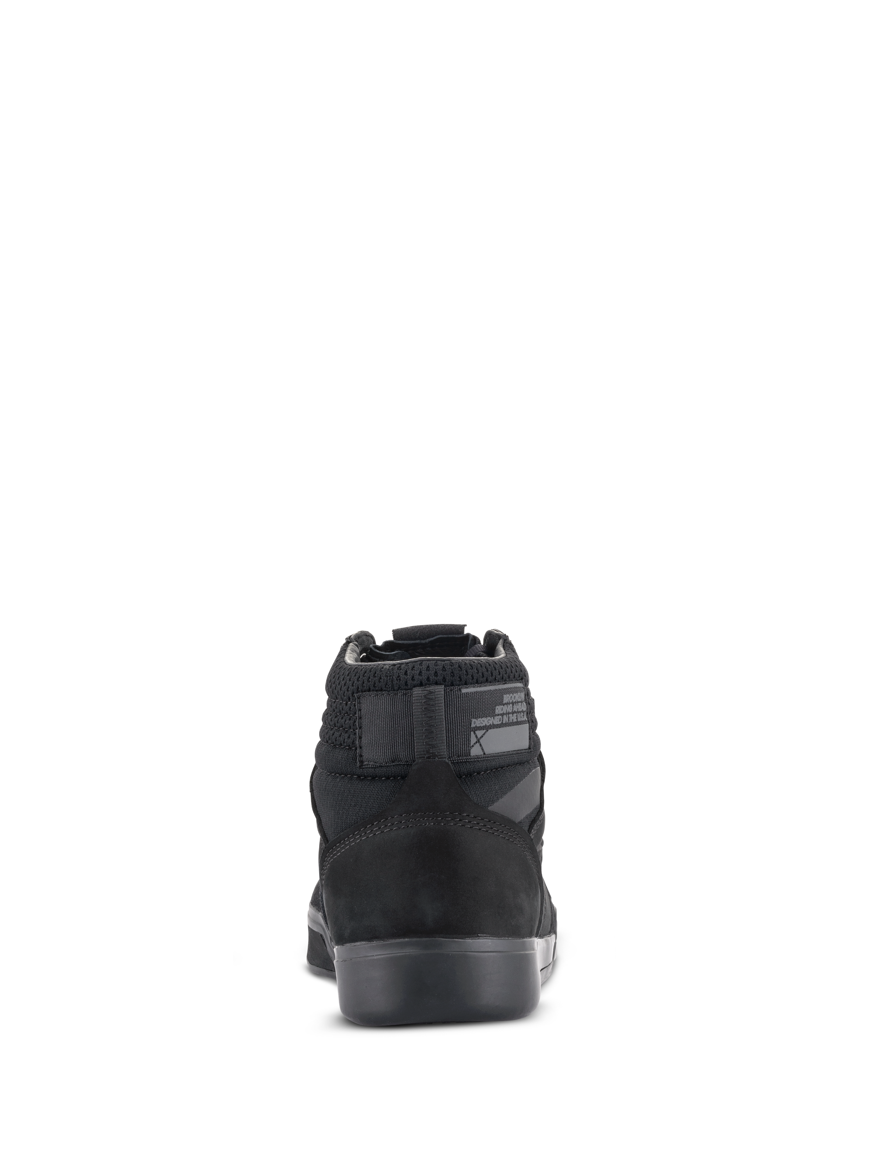 Scarpe da moto Alpinestars Primer, nero su nero, vista posteriore con tallone rinforzato, colletto in mesh e suola in gomma, calzature protettive per uso urbano