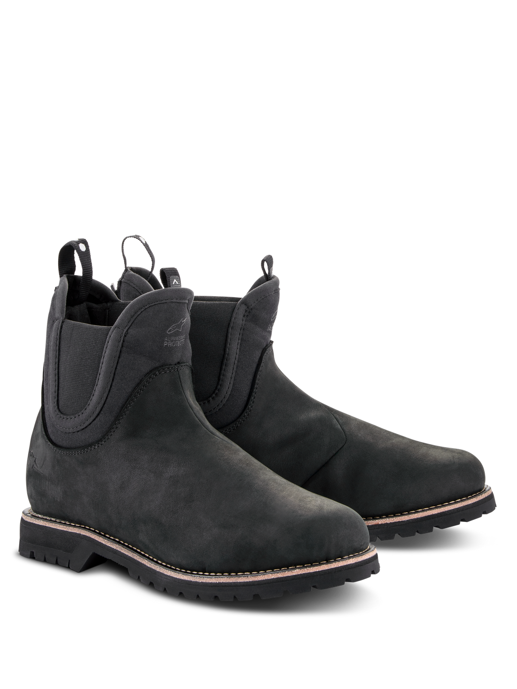 Scarpe Alpinestars Turnstone, stivali da moto neri stile Chelsea, tomaia in pelle bovina opaca con pannelli laterali elastici e linguette posteriori, calzature da guida urbana con suola carrarmato robusta e cuciture bianche sul guardolo