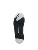 Scarpe Alpinestars Speedflight, nero e bianco, vista della suola esterna in gomma a doppia densità, con logo Alpinestars e marchio TPF, battistrada asimmetrico per aderenza e stabilità nella guida della moto