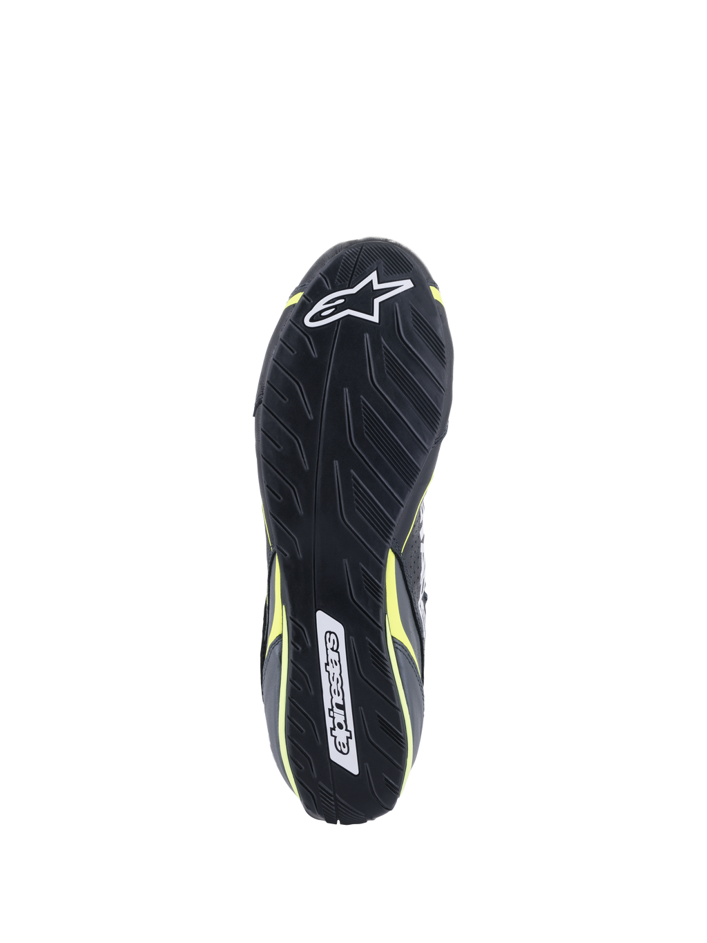 Alpinestars Scarpe Tech-1 T V3 FIA, vista della suola, nero con accenti giallo fluo, suola in gomma asimmetrica ispirata al battistrada, con loghi Alpinestars e trama testurizzata per sensibilità sui pedali e aderenza.
