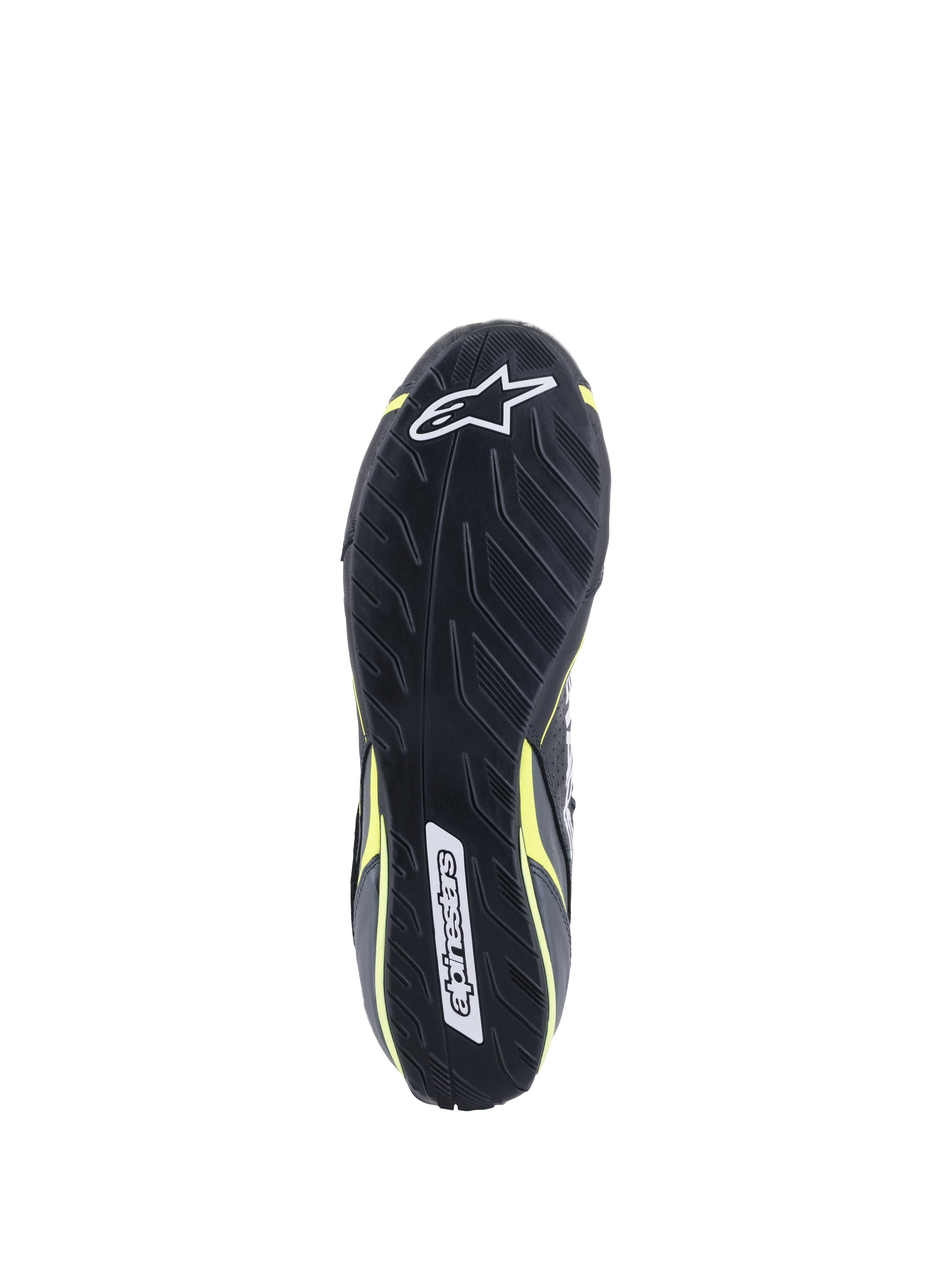 Alpinestars Scarpe Tech-1 T V3 FIA, vista della suola, nero con accenti giallo fluo, suola in gomma asimmetrica ispirata al battistrada, con loghi Alpinestars e trama testurizzata per sensibilità sui pedali e aderenza.