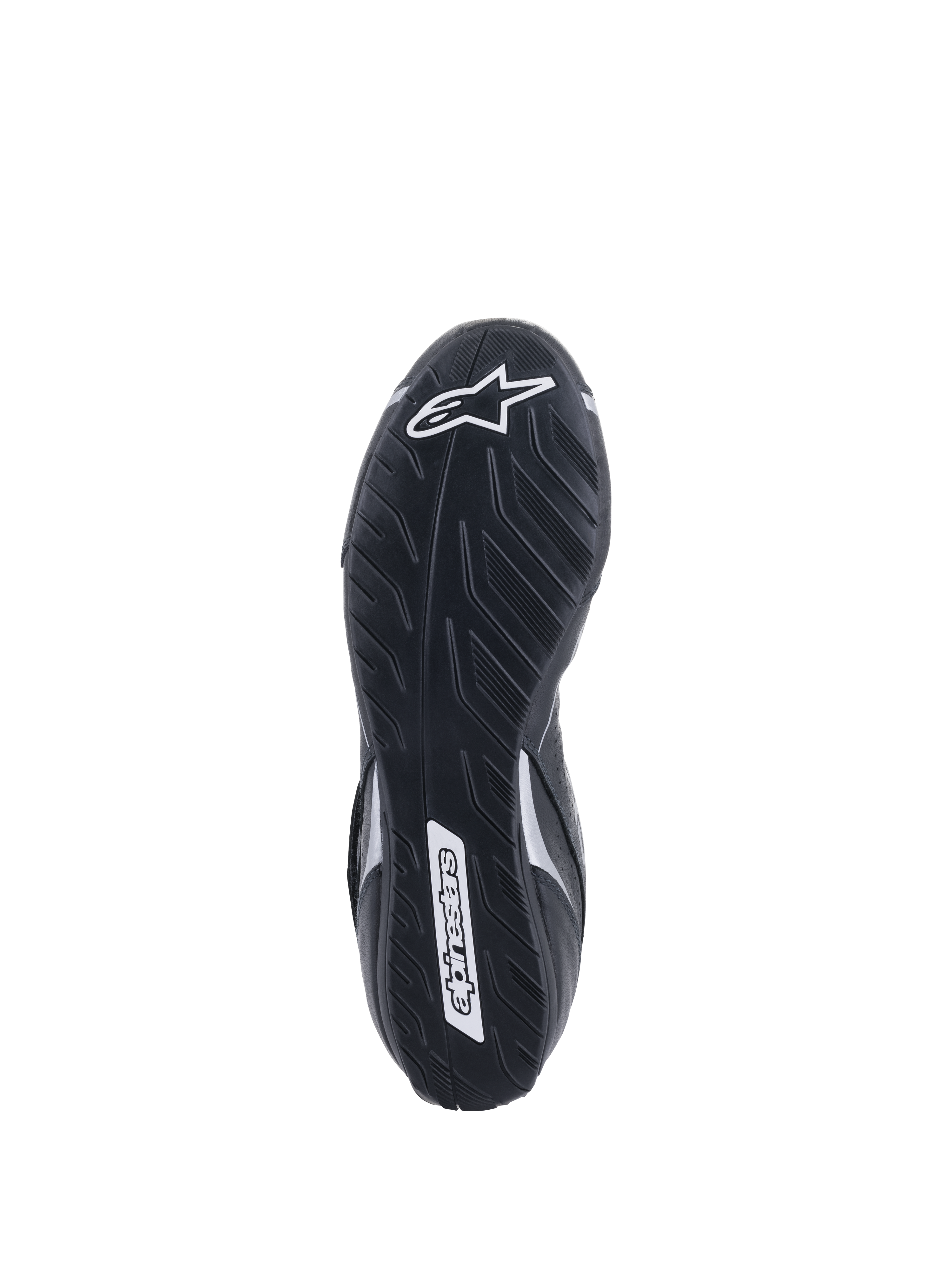 Scarpe Alpinestars Tech-1 T V3 FIA, vista della suola, nero e argento, suola asimmetrica in gomma con disegno del battistrada, logo Alpinestars bianco, mescola sottile per la sensibilità sui pedali
