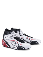 Scarpe Alpinestars Tech-1 T V3 FIA, calzature da corsa automobilistica, bianco con accenti neri e rossi, tomaia in pelle pieno fiore, cinturino alla caviglia regolabile a strappo, pannelli laterali traforati con logo Astars e design professionale da gara.