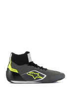 Alpinestars Supertech Shoes FIA/SFI, scarpe da corsa professionali high-top, grigio freddo e nero con accenti giallo fluo, con tomaia in maglia aramidica, talloniera in fibra di carbonio, logo a stella giallo e suola sottile bianca e nera, calzature certificate per il motorsport