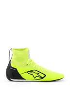 Scarpe Alpinestars Supertech K - FIA, scarpe da karting, giallo fluo e nero, vista laterale, tomaia completamente in maglia con colletto alto sulla caviglia, contrafforte del tallone in TPU nero, grande logo Alpinestars nero, calzatura da corsa leggera
