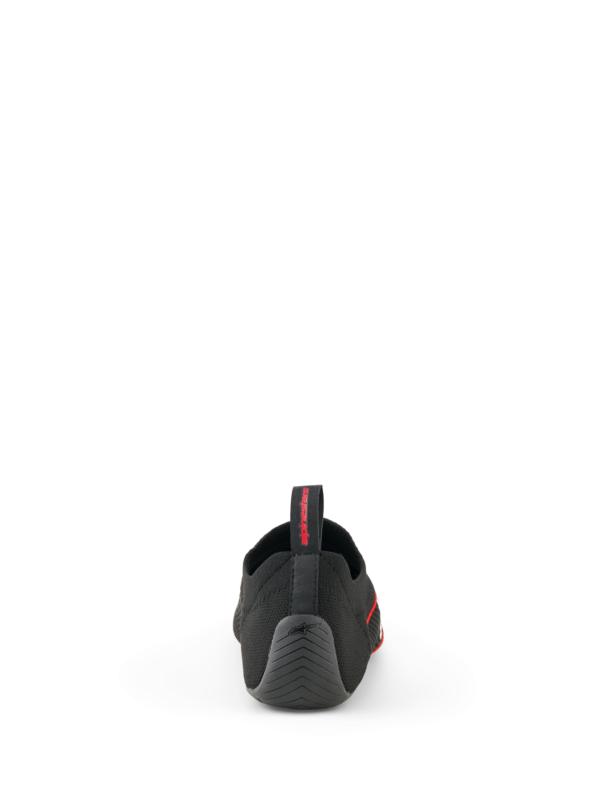 Scarpe Alpinestars Tech Gaming, nero, vista posteriore che mostra la tomaia in maglia senza cuciture, tallone in gomma testurizzata con logo a stella e linguetta posteriore con marchio rosso, calzature per SIM-racing