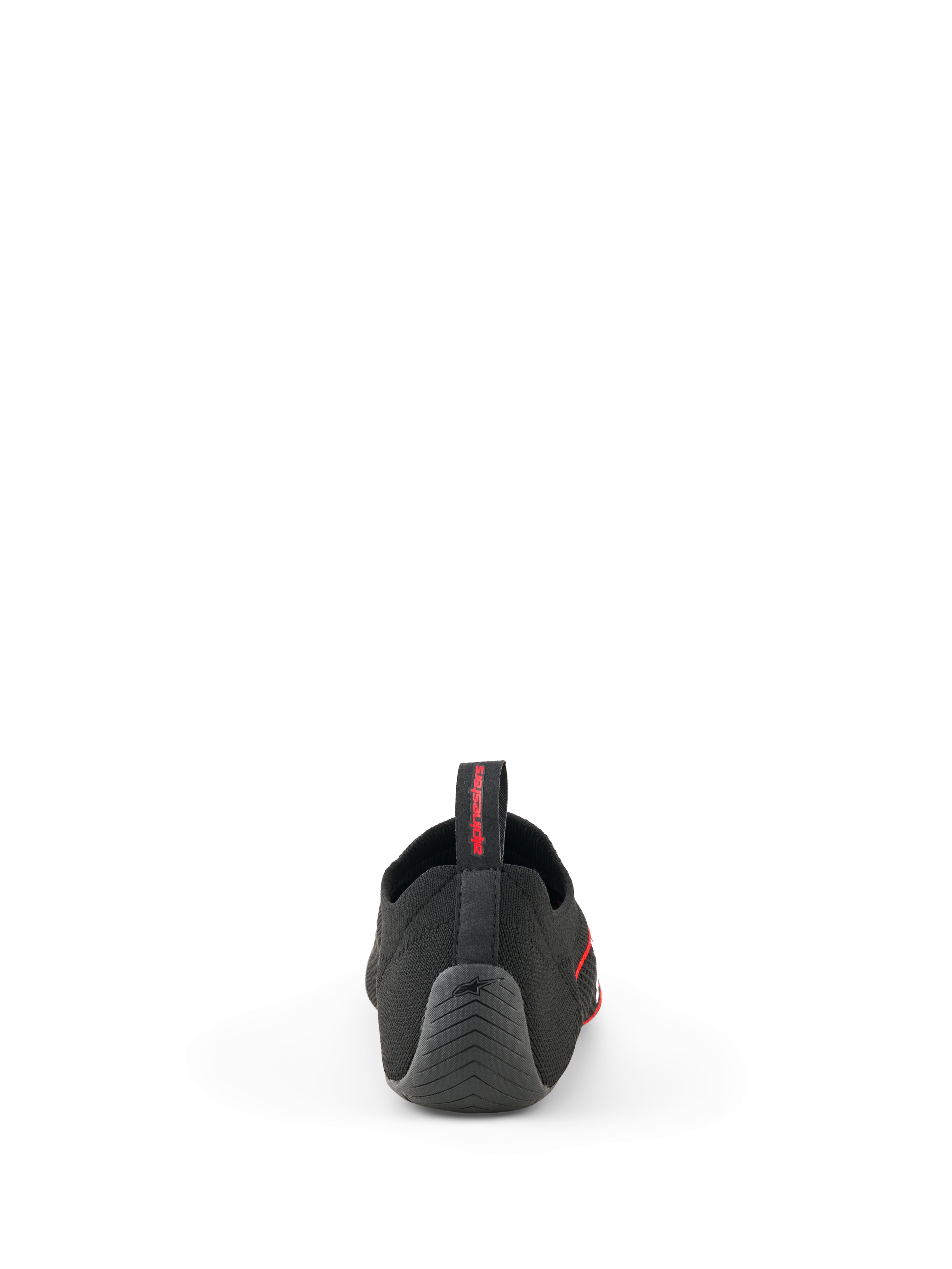 Scarpe Alpinestars Tech Gaming, nero, vista posteriore che mostra la tomaia in maglia senza cuciture, tallone in gomma testurizzata con logo a stella e linguetta posteriore con marchio rosso, calzature per SIM-racing