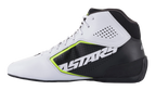 Scarpe Alpinestars Tech-1 K Start V2, scarpe da karting, bianco, nero e giallo fluo, vista laterale con tomaia in microfibra bianca traforata, pannello laterale nero con vistoso marchio ASTARS, dettagli giallo neon e suola nera affusolata.