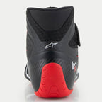 Alpinestars Tech-1 KX V3 Shoes, scarpe da kart, nero bianco rosso, vista posteriore che mostra il tallone rosso sagomato e il logo bianco, caratterizzate da una finitura testurizzata e colletto in mesh traspirante per prestazioni in pista