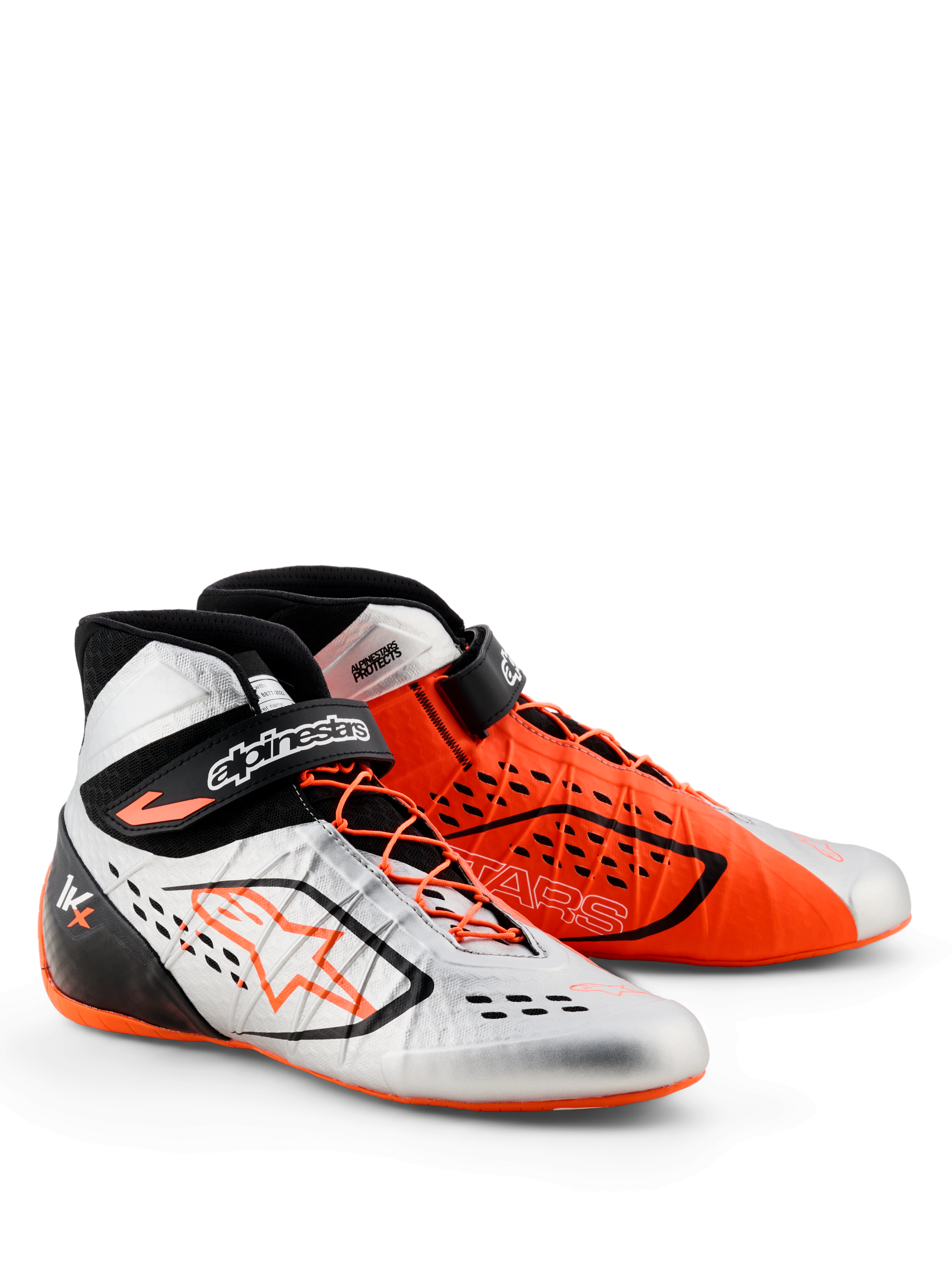 Alpinestars Tech-1 KX V3 - FIA, scarpe da karting, nero, argento e arancione fluo, design con colori spaiati con una scarpa argento e una arancione, caratterizzate da allacciatura asimmetrica e cinturini regolabili sulla caviglia, struttura leggera per prestazioni da gara