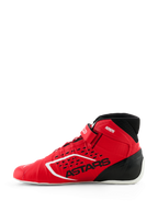 Scarpe Alpinestars Tech-1 KX V3, scarpe da kart FIA, rosso e nero, vista laterale di profilo, con costruzione termosaldata senza cuciture, perforazioni tagliate al laser, branding ASTARS nero e design racing leggero.