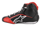 Alpinestars Youth Tech-1 K Shoes, calzature da karting, nero, bianco e rosso, profilo laterale con logo a stella bianco, colletto in mesh rosso, lacci bianchi e cinturino alla caviglia, design leggero in microfibra e mesh per le corse