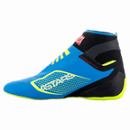 Scarpe Alpinestars Tech-1 KZ V2, scarpe da karting, blu smalto con dettagli neri e giallo fluo, vista laterale con tomaia in maglia senza cuciture e suola sottile in gomma derivata dalla Formula 1, logo ASTARS sul lato