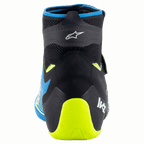 Scarpe Alpinestars Tech-1 KZ V2, scarpe da karting, nero, blu smalto e giallo fluo, vista posteriore con costruzione della tomaia in maglia, logo Alpinestars e supporto per il tallone giallo fluo brillante