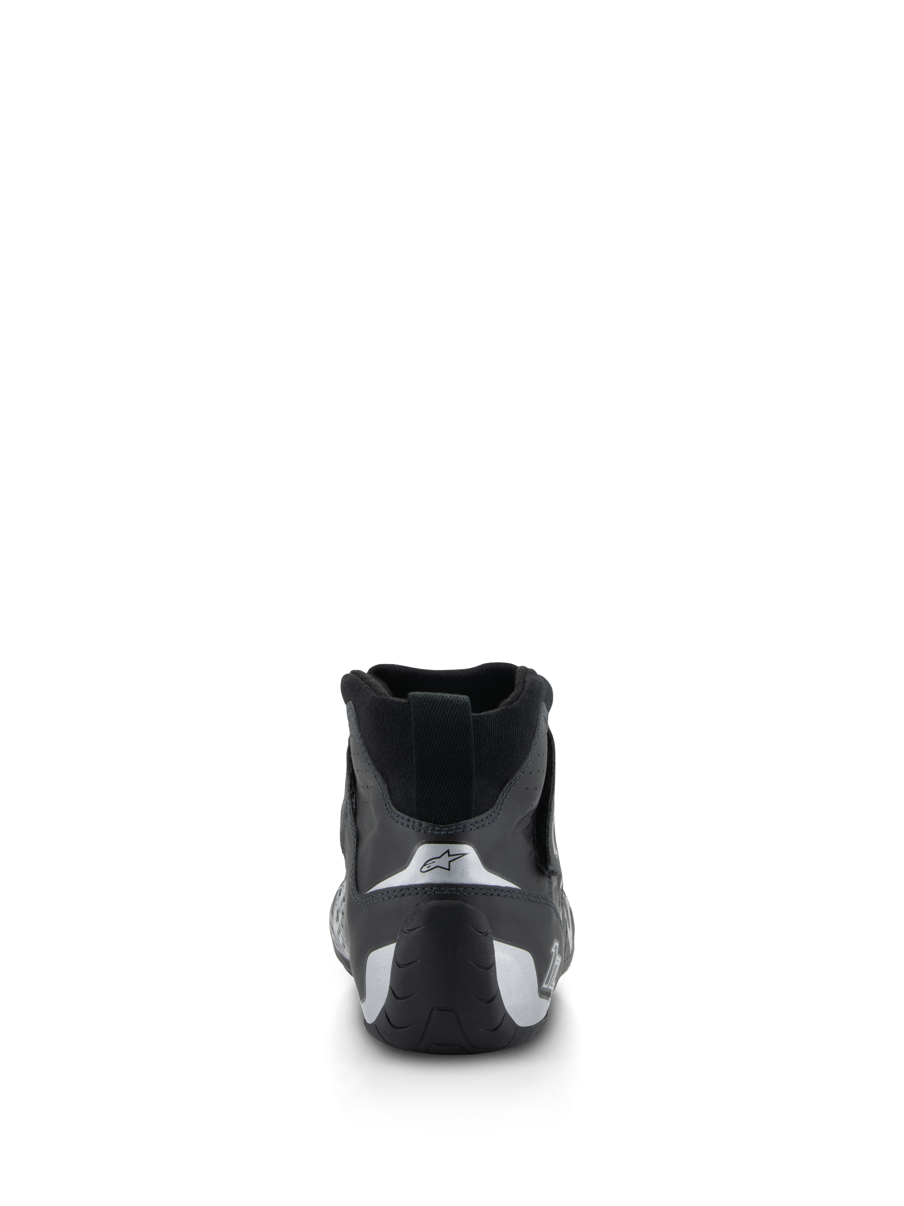 Scarpe Alpinestars Tech-1 Z V3 FIA, scarpe da racing auto, nero e argento, vista posteriore che mostra il tallone sagomato con accenti argento e il logo a stella, calzature professionali per motorsport