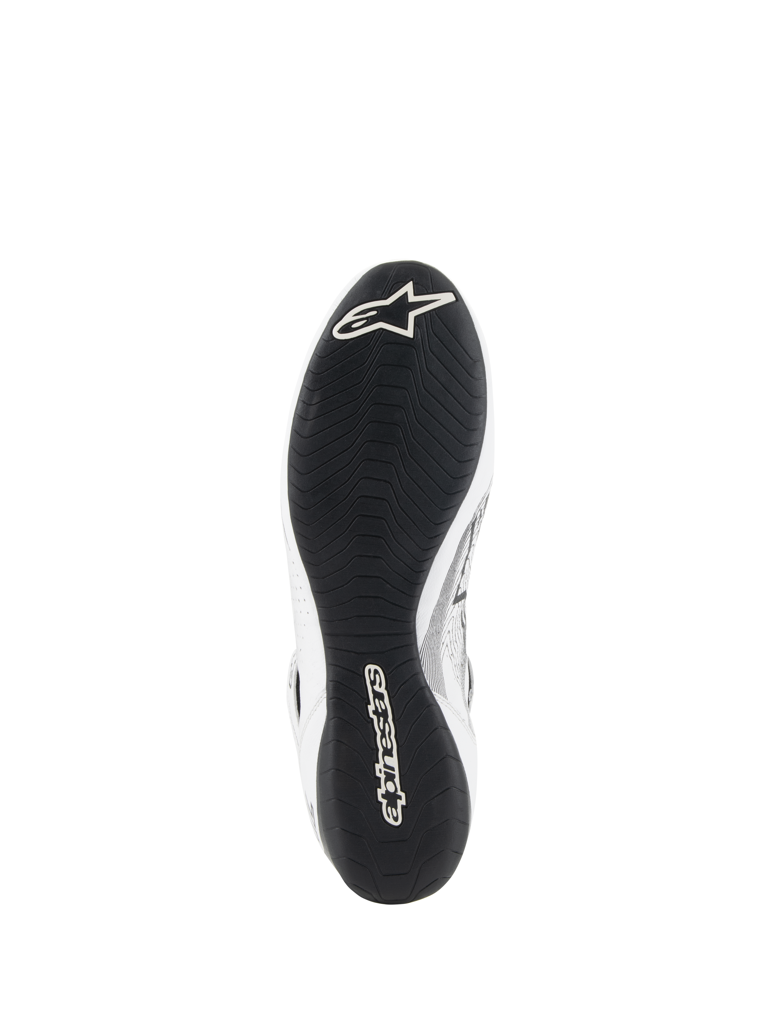 Alpinestars Tech-1 Z V3 Shoes FIA, scarpe da auto, bianco e nero, vista dal basso che mostra la sottile suola in gomma derivata dalla F1 con battistrada asimmetrico, logo Alpinestars bianco sulla punta e branding sul tallone
