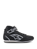 Scarpe Alpinestars Radar, calzature professionali per pit crew da corsa, nero e bianco, tomaia in pelle traforata con grande logo a stella bianco, design alto con cinturino in velcro sulla caviglia e lacci, stile resistente ispirato al motorsport