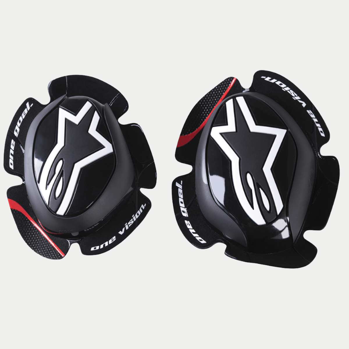Slider per ginocchia Alpinestars GP Pro, nero, con logo a stella Alpinestars bianco, scritta 'one goal. one vision.' sui bordi, striscia rossa sulle ali testurizzate, mescola polimerica anatomica per abbigliamento da gara motociclistica