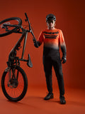 Maglia Alpinestars A-Dura ASTARS 2.0 manica lunga arancio-nera sfumata con logo e attrezzatura da mountain bike.