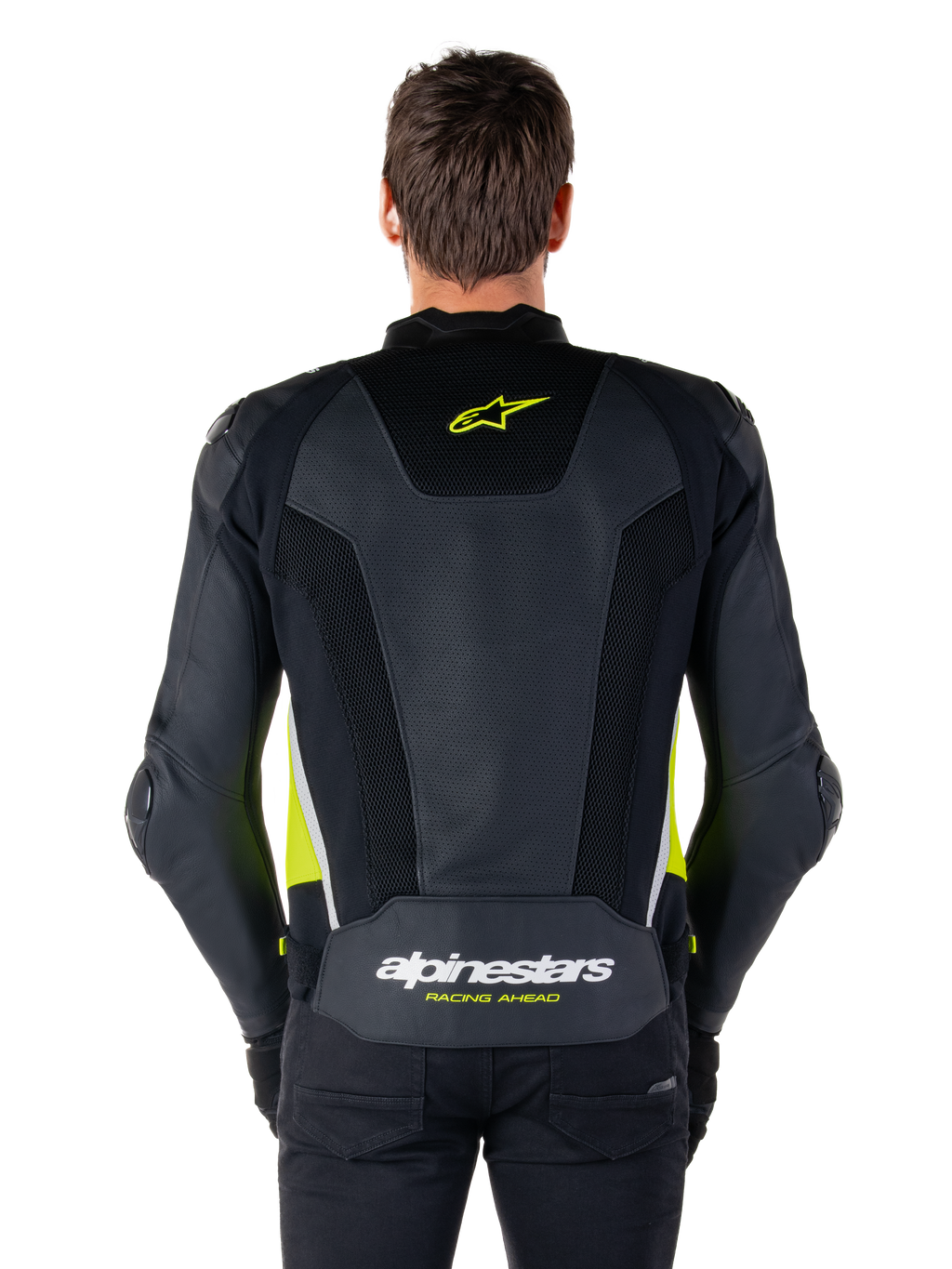 Giacca in pelle Alpinestars Missile V3 Airflow, vista posteriore, nero con accenti giallo fluo e bianco, ampi pannelli in pelle traforata per la ventilazione, branding Alpinestars sulla parte superiore e inferiore della schiena, giacca sportiva da moto ispirata alle corse