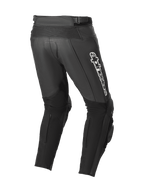 Pantaloni in pelle Alpinestars Track V2, nero, vista posteriore con zone elasticizzate in pelle a soffietto, marchio Alpinestars bianco sulla coscia, ampi pannelli elasticizzati sui polpacci e saponette integrate per uso in pista e su strada