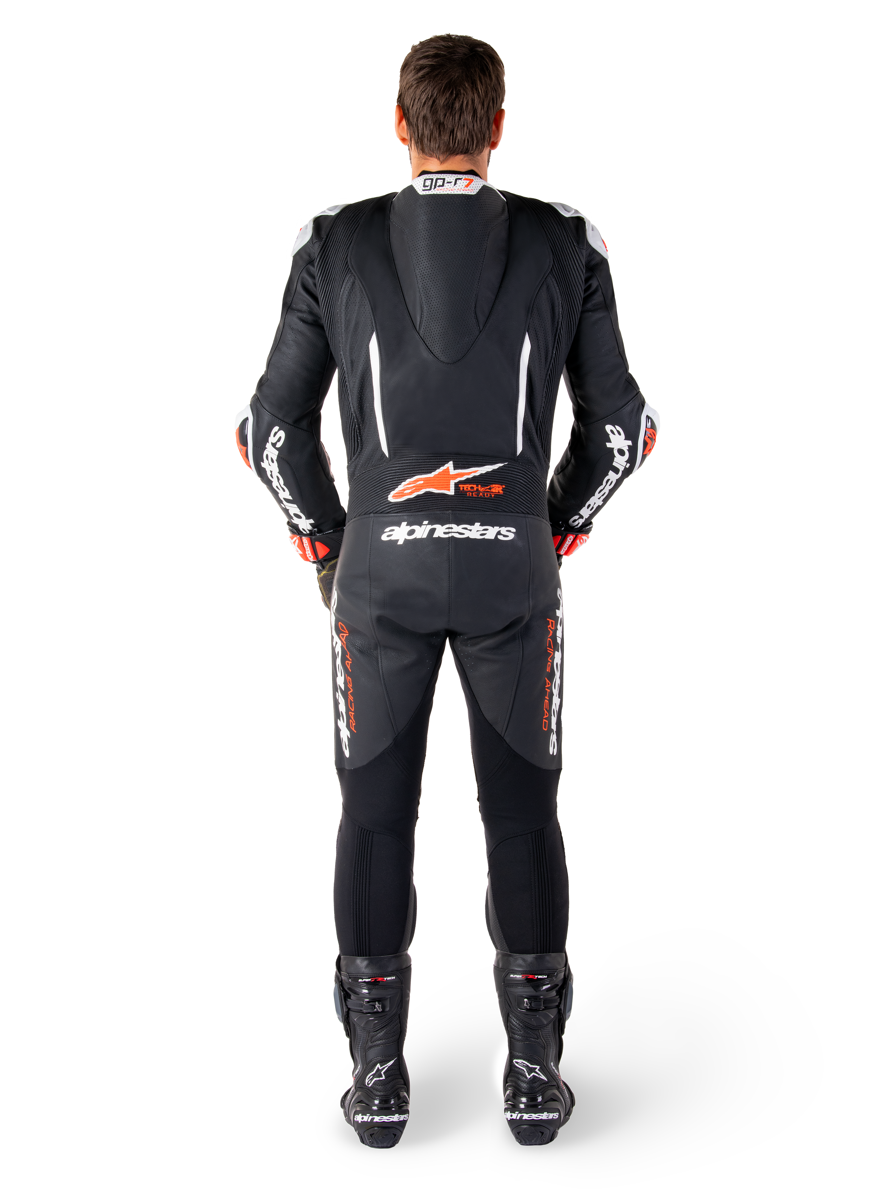 Alpinestars tuta in pelle GP-R7, nero e bianco con rosso fluo, gobba aerodinamica e inserti a soffietto per racing.