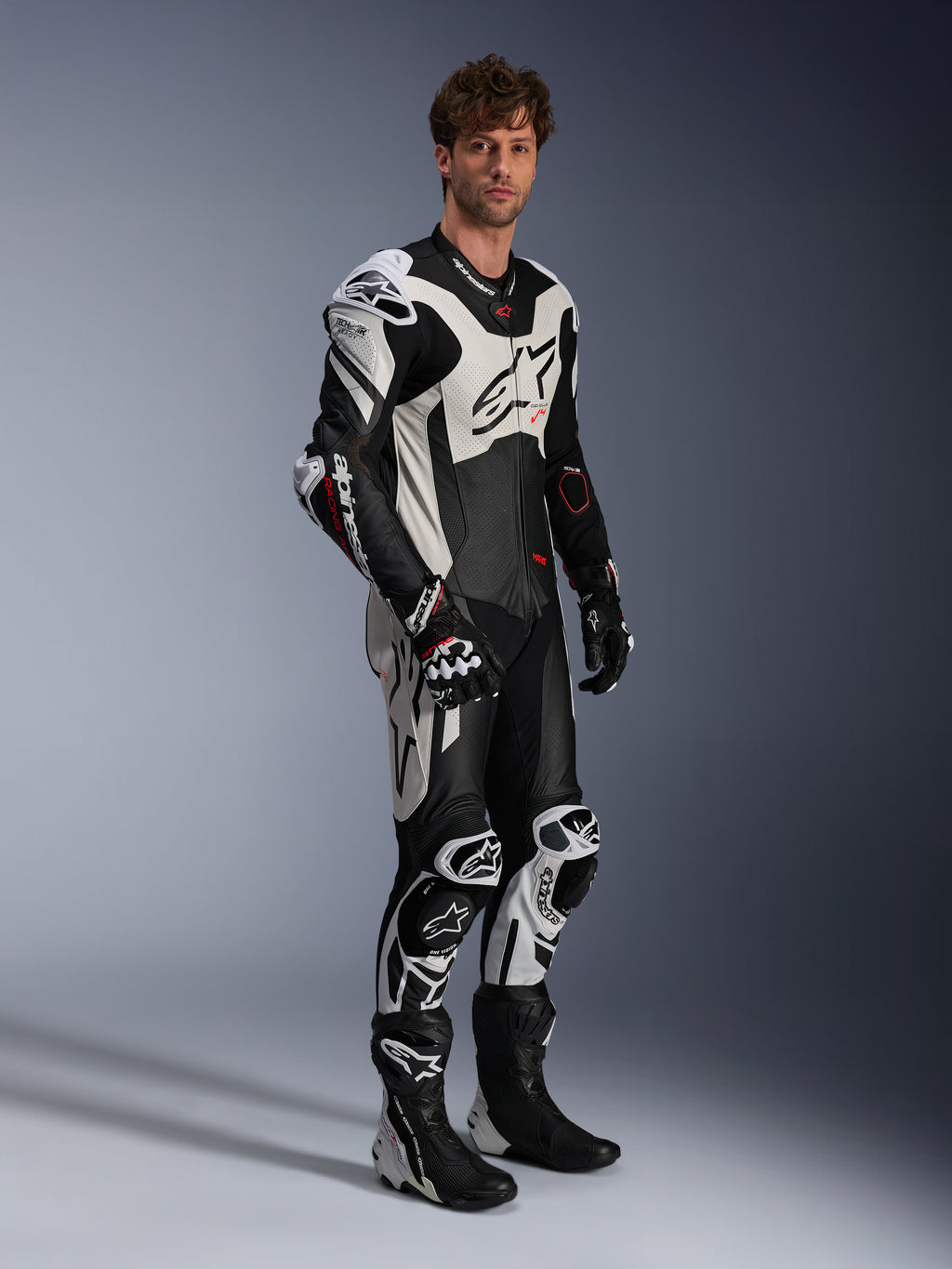Alpinestars Tuta in pelle GP Plus V4 Sprint 1 Pezzo, nero, bianco e rosso fluo, tuta da moto racing da uomo Tech-Air Ready.