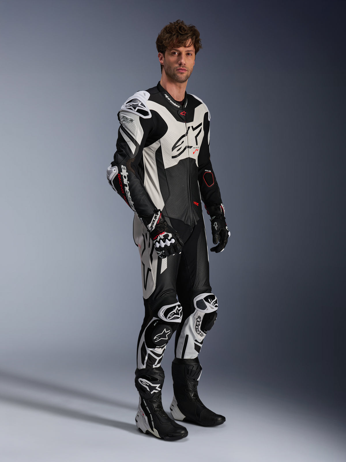 Alpinestars Tuta in pelle GP Plus V4 Sprint 1 Pezzo, nero, bianco e rosso fluo, tuta da moto racing da uomo Tech-Air Ready.