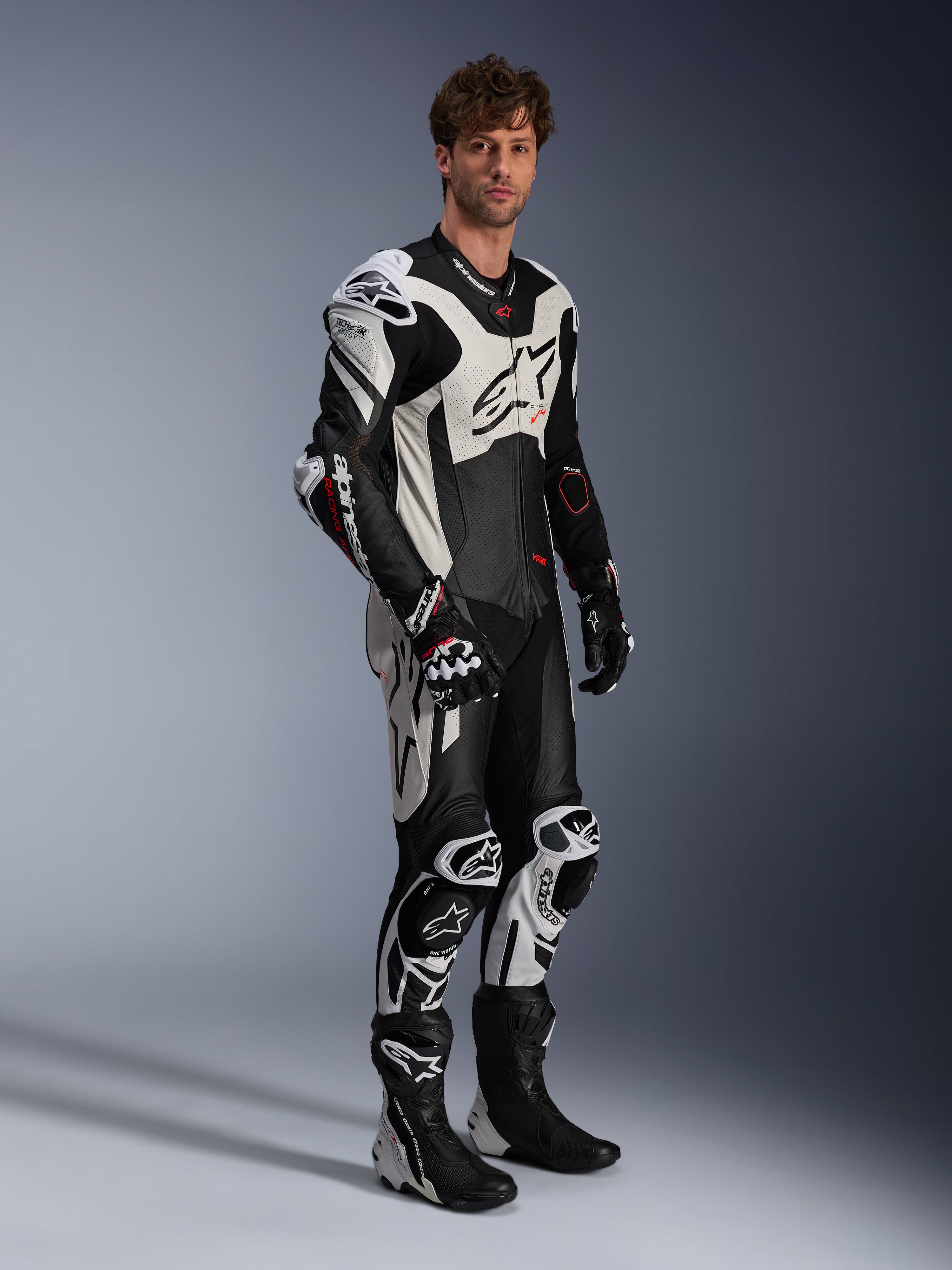 Alpinestars Tuta in pelle GP Plus V4 Sprint 1 Pezzo, nero, bianco e rosso fluo, tuta da moto racing da uomo Tech-Air Ready.