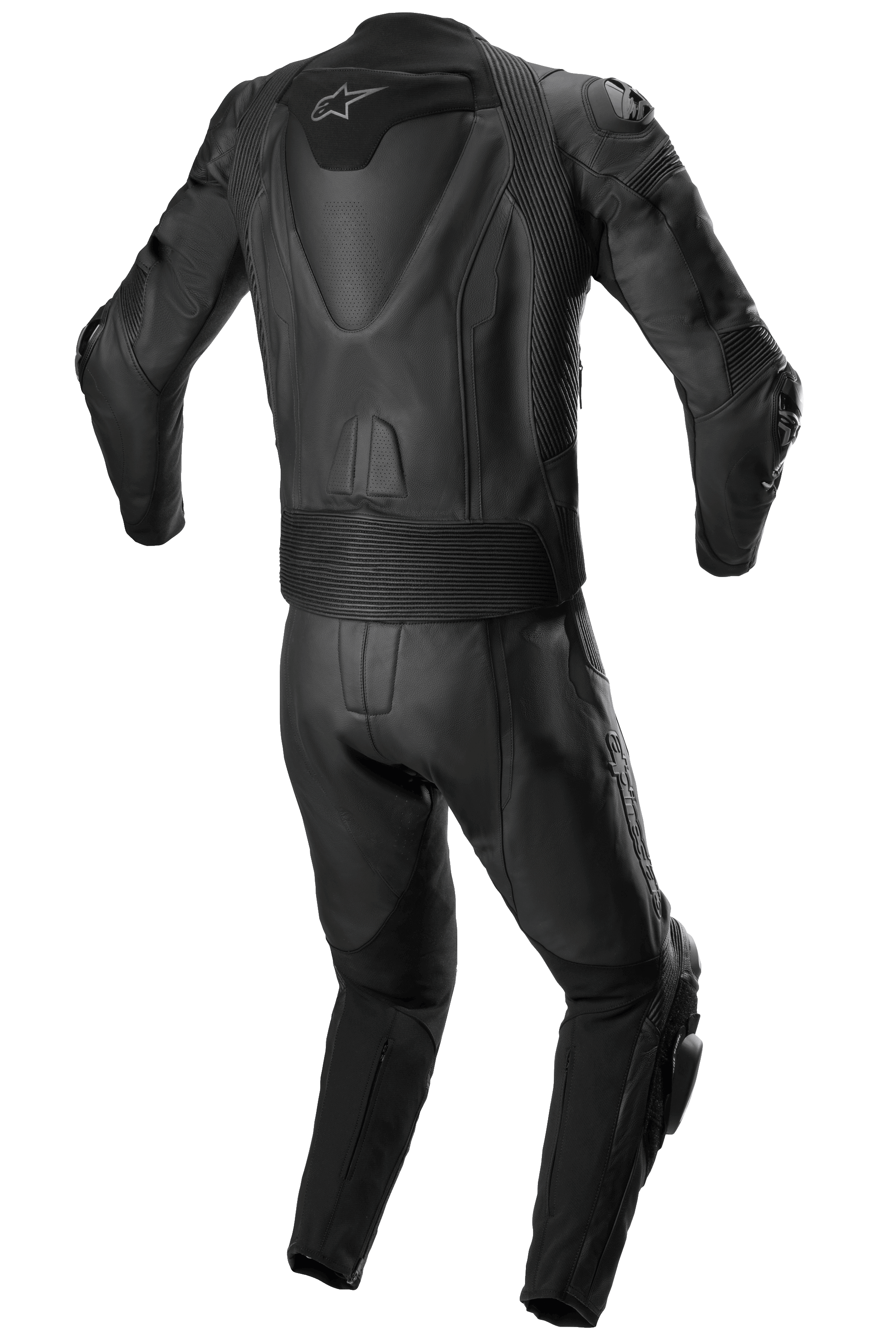 Tuta in pelle Alpinestars Missile V2 2 pezzi, tuta da corsa in pelle, completamente nera, vista posteriore che mostra la gobba aerodinamica con logo a stella bianco, pannelli a fisarmonica elasticizzati in vita e sulle spalle e dettagli in pelle traforata per la guida sportiva in moto